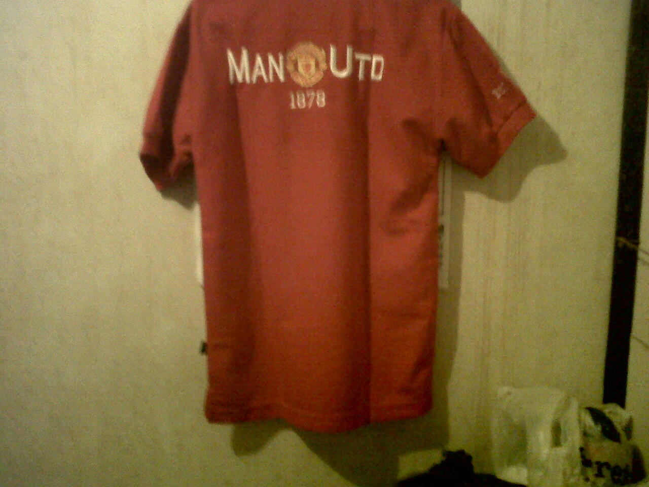 Polo MU Merah