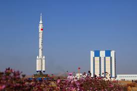 China launches three person crew on Shenzhou-10