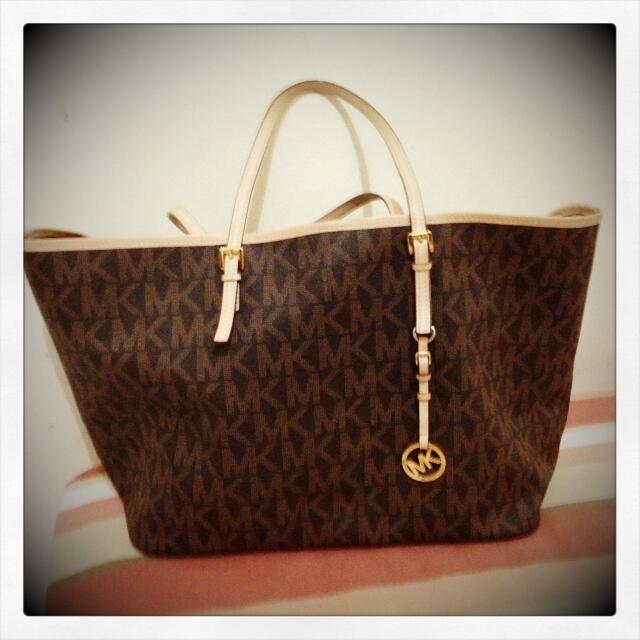 Jual tas second Michael Kors jet set travel logo