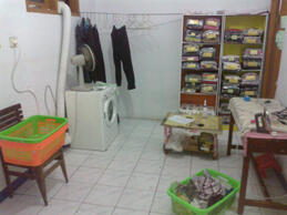 share bisnis laundry