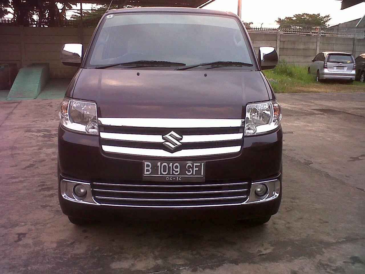 Suzuki APV Arena GX MT tahun 2009 merah marun