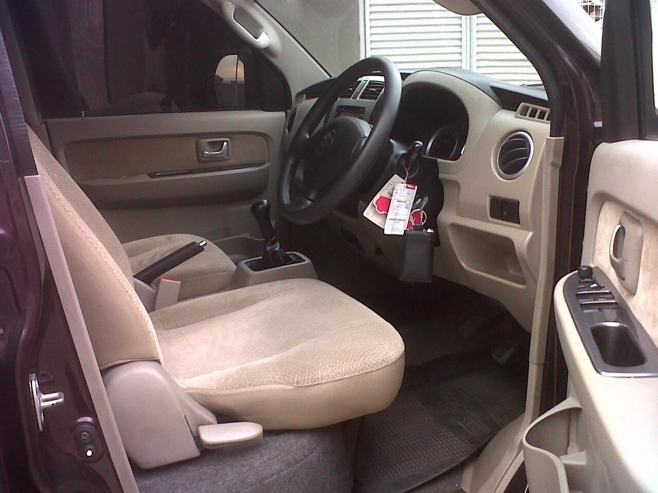Suzuki APV Arena GX MT tahun 2009 merah marun