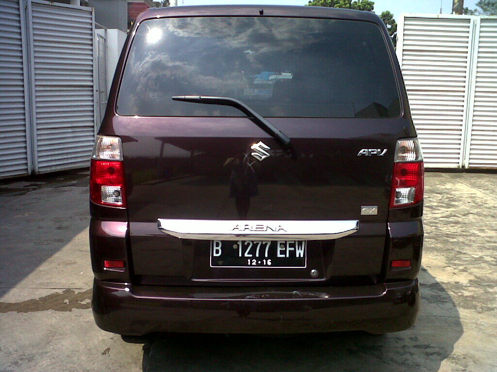 Suzuki APV Arena GX MT tahun 2011 merah bergendi