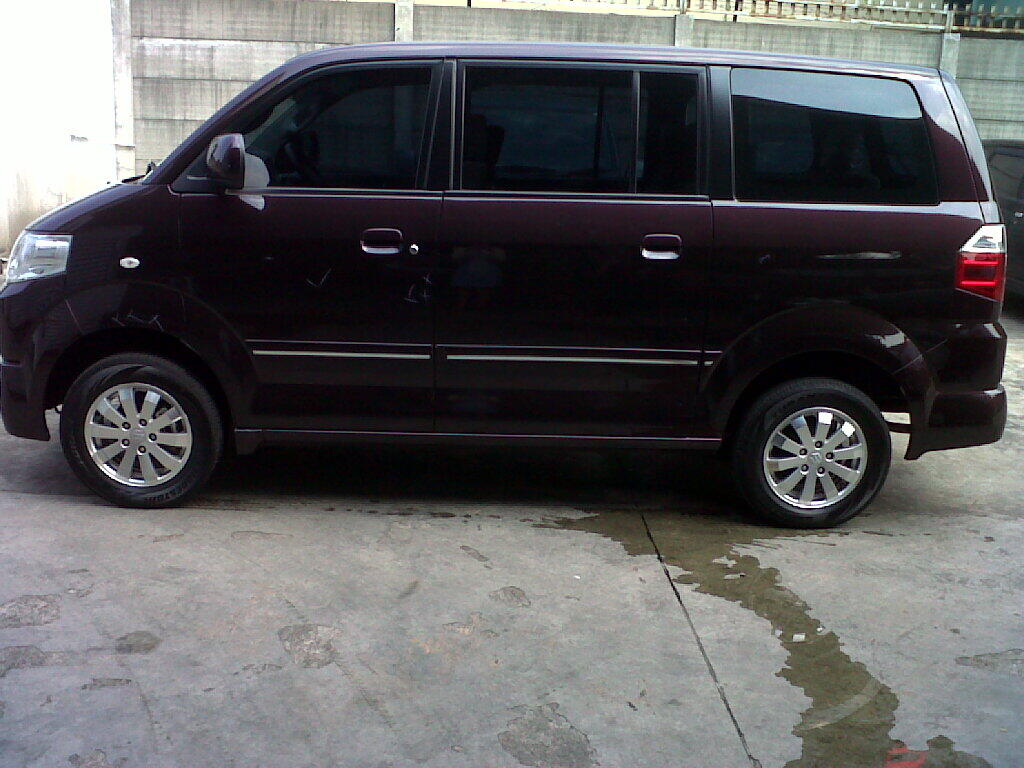 Suzuki APV Arena GX MT tahun 2011 merah bergendi