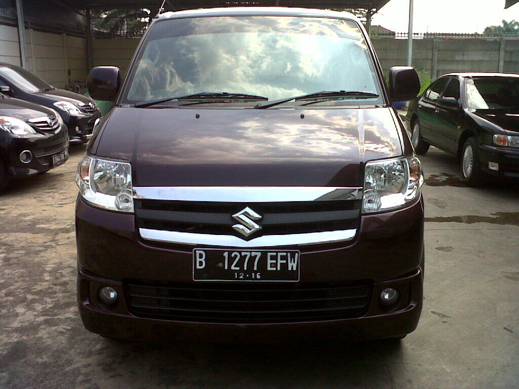 Suzuki APV Arena GX MT tahun 2011 merah bergendi