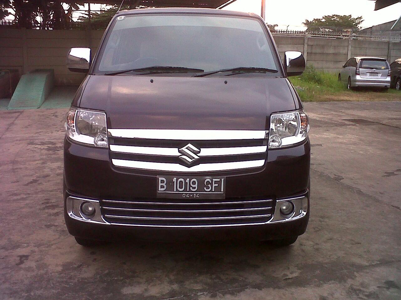 Suzuki APV Arena GX MT tahun 2009 merah maroon