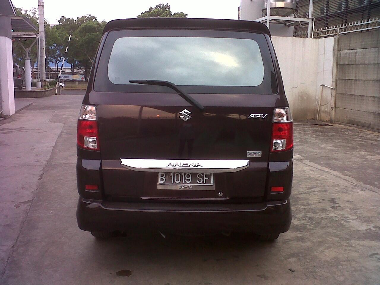 Suzuki APV Arena GX MT tahun 2009 merah maroon
