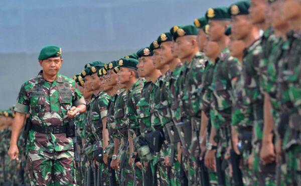 Makna miring baret TNI dengan POLRI...