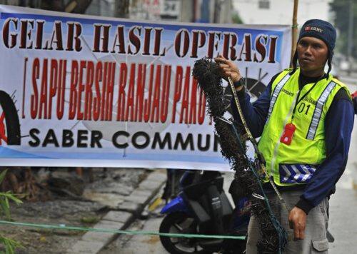 Komunitas Saber Ranjau Paku, Sang Pahlawan Jalanan Ibukota