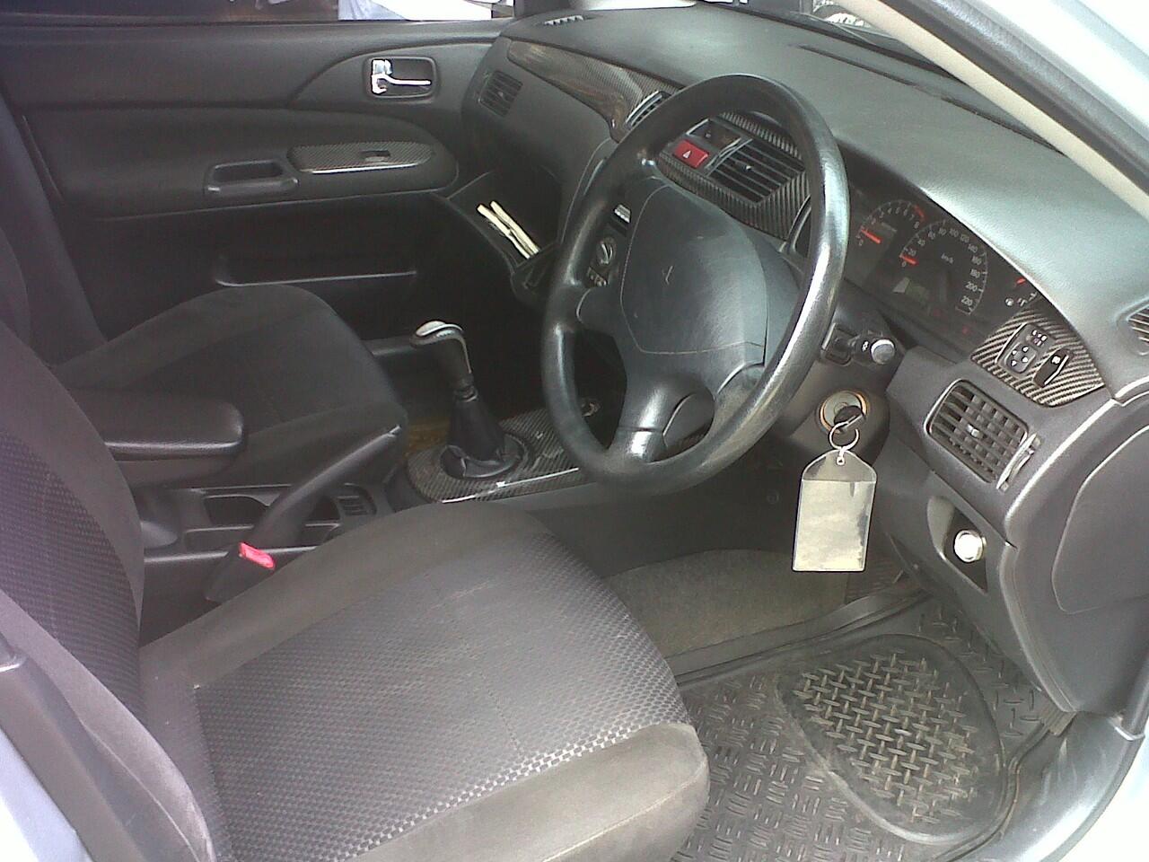 Lancer GLXI MT 1.8 Nego