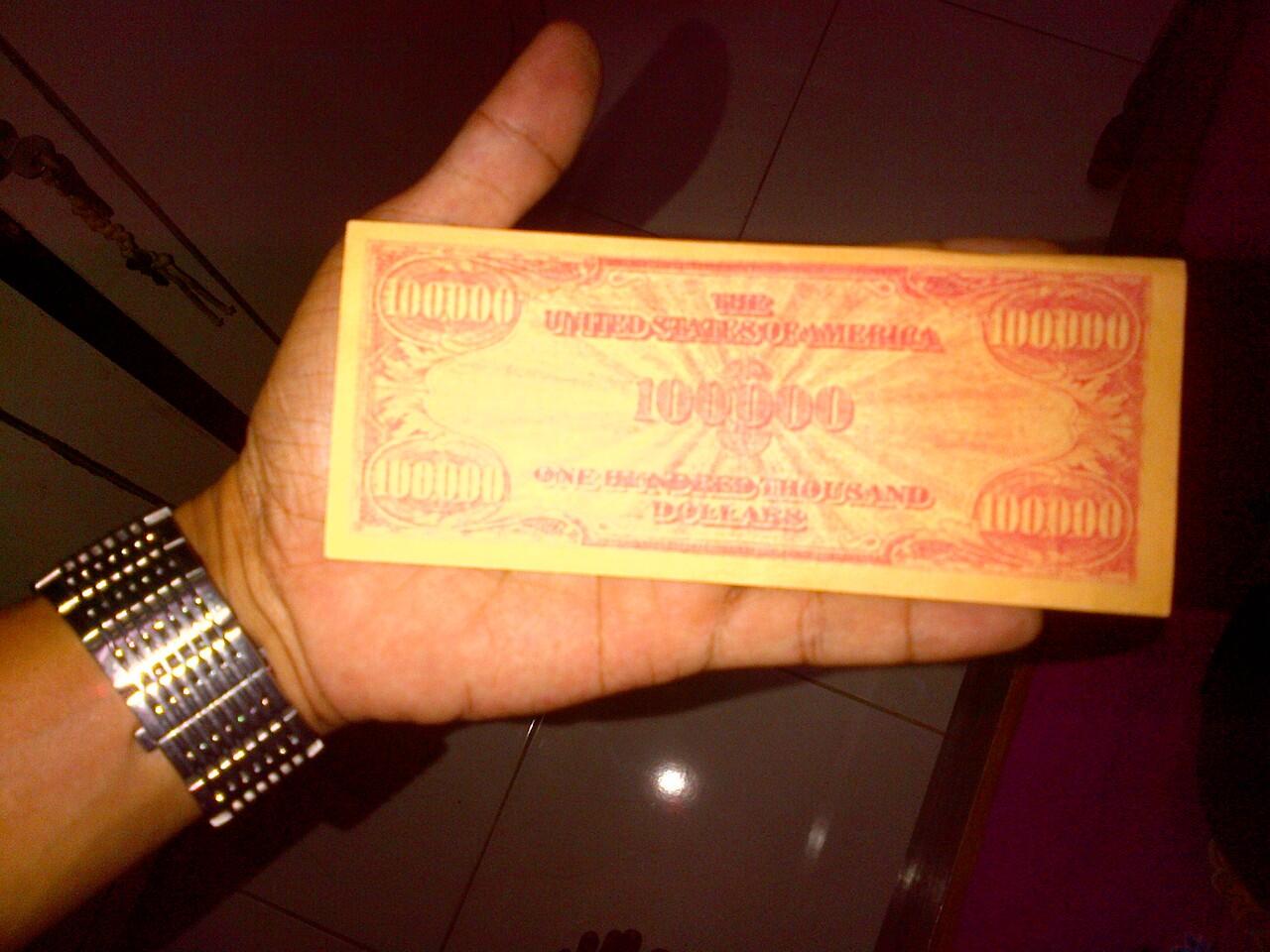 Ada yang tau cara mencairkan uang $ 100.000 ini ?