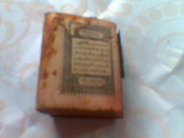 Jual Al Quran terkecil...panjang 1,5 cm dan lebar 1 cm..