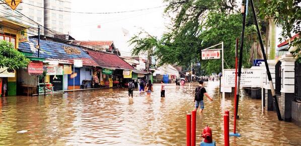 Banjir dan Macet Mengepung Kota Jakarta