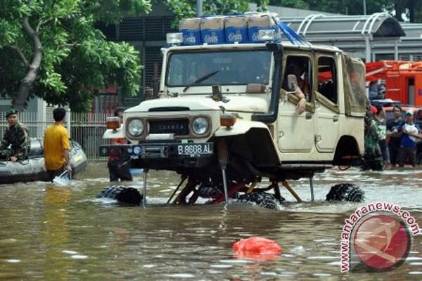 Menghidupkan Mesin Saat Kendaraan Terendam Banjir, Hanguskan Klaim Asuransi
