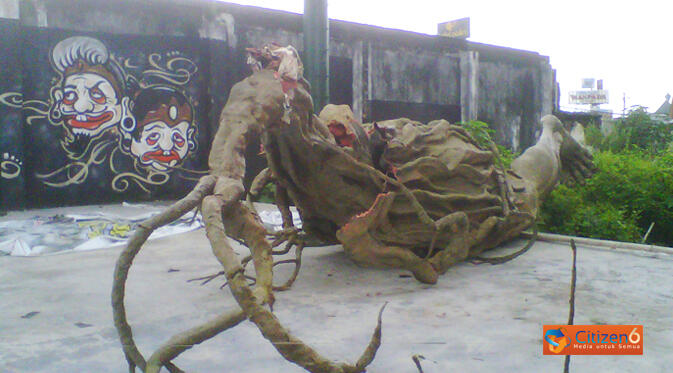 Patung Akar Nol KM
