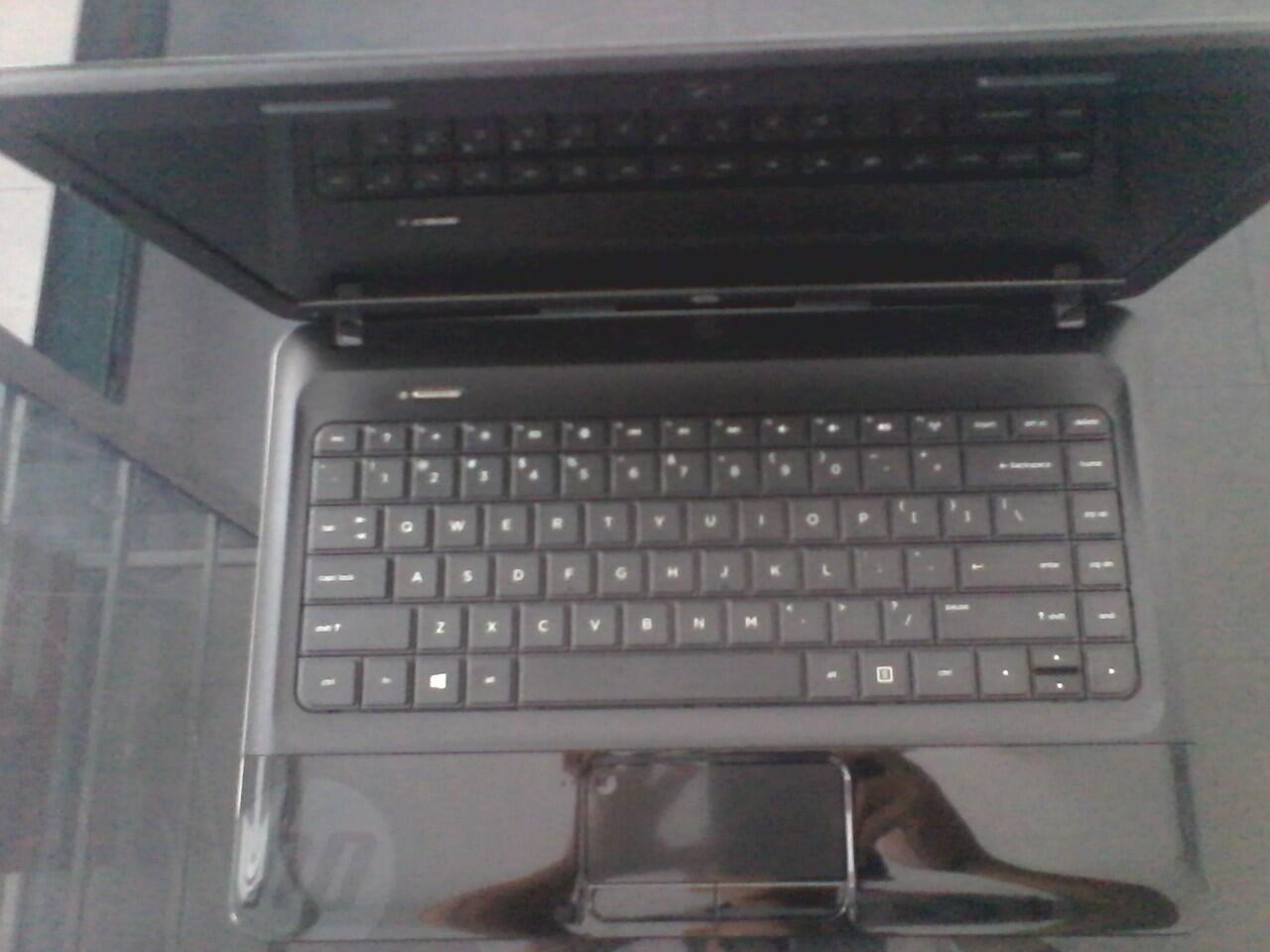 hp 1000-1b06AU