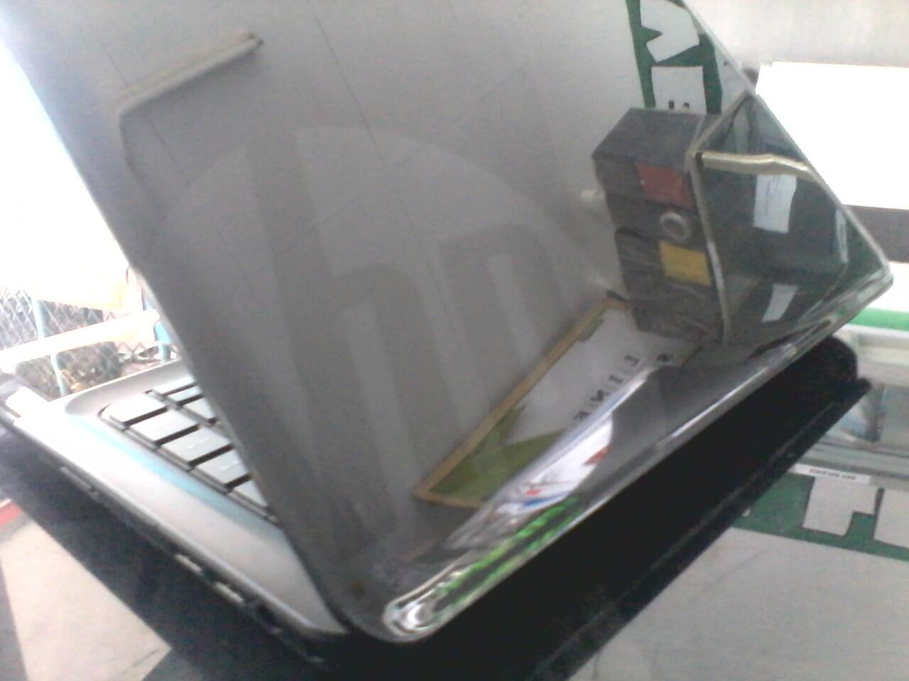 hp 1000-1b06AU