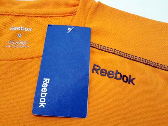 Baju Tenis Reebok Maximum Orange Gravel