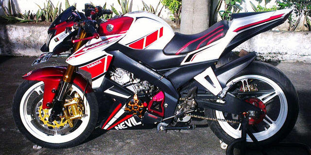 kalau buat touring pilih new vixion atau megapro??