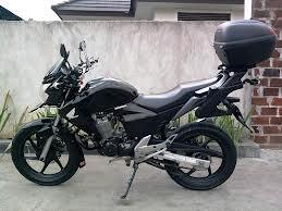 kalau buat touring pilih new vixion atau megapro??