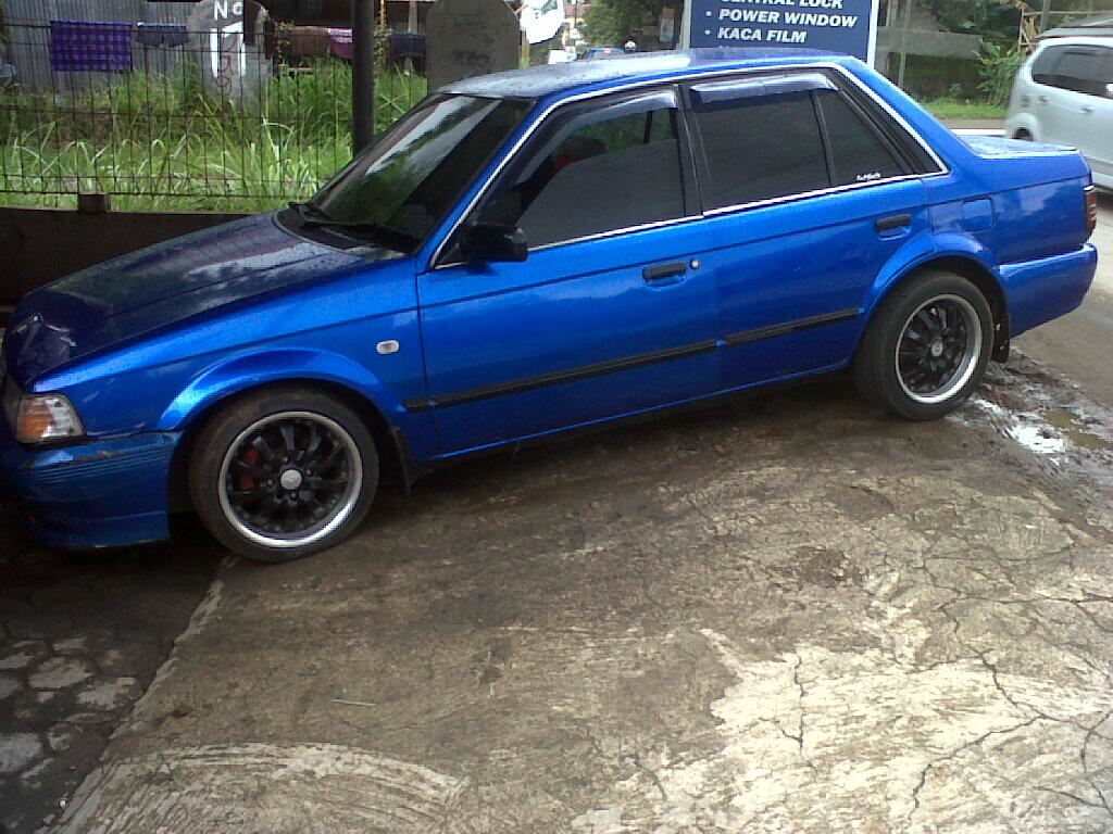 Terjual FORD LASER 1996BLUE METALICc KASKUS