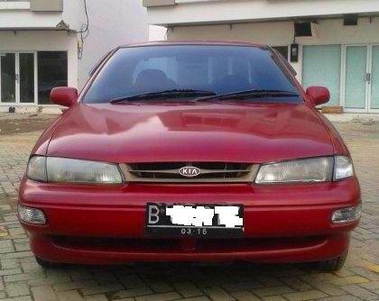 TIMOR DOHC 2000 MERAH METALIK KONDISI SANGAT BAGUS SIAP UNTUK MUDIK