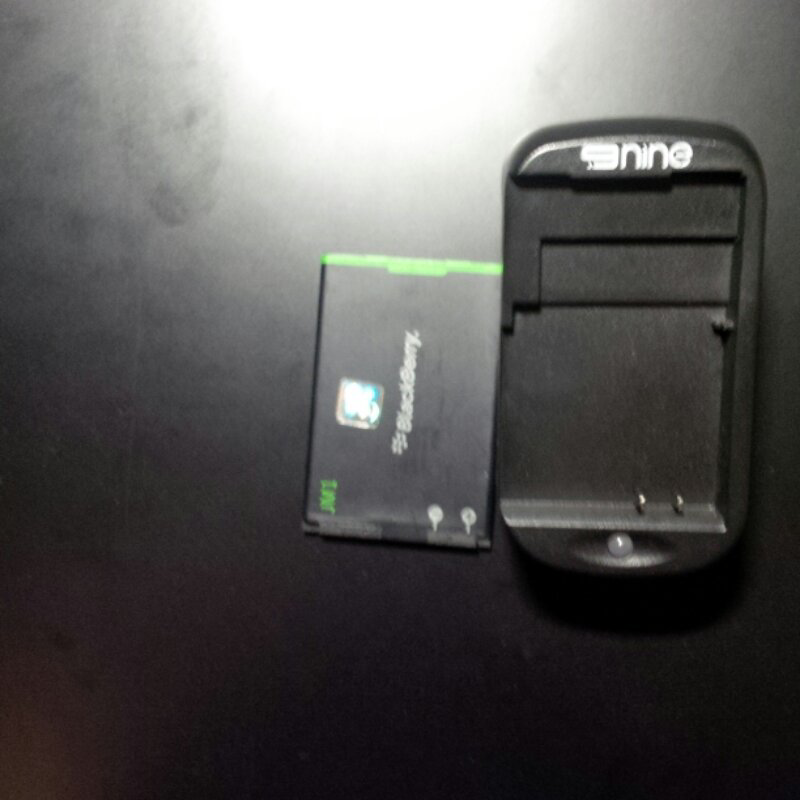 baterai original jm-1 buat blackberry belagio dakota + desktop charger nine