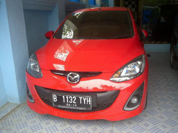 jual mazda 2 V AT merah cantik istimewa