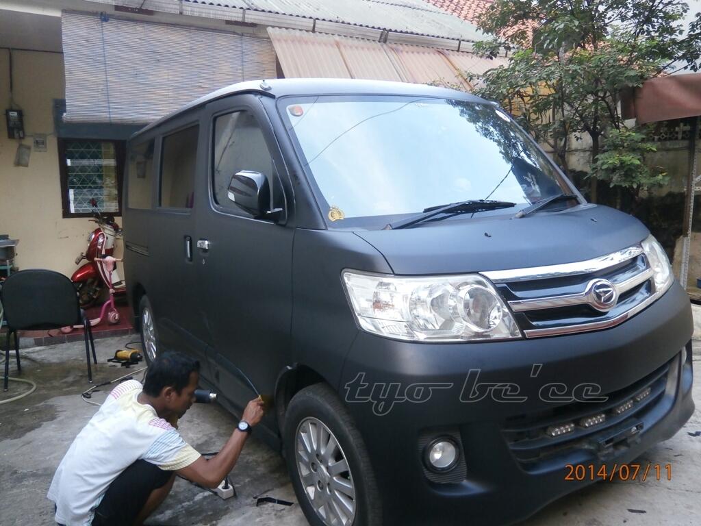 Jual wrapping dan cuting stiker  mobil  plus jasa pasang 