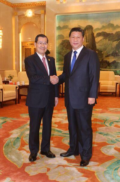 Taiwan urges China to raise economic ties to new level