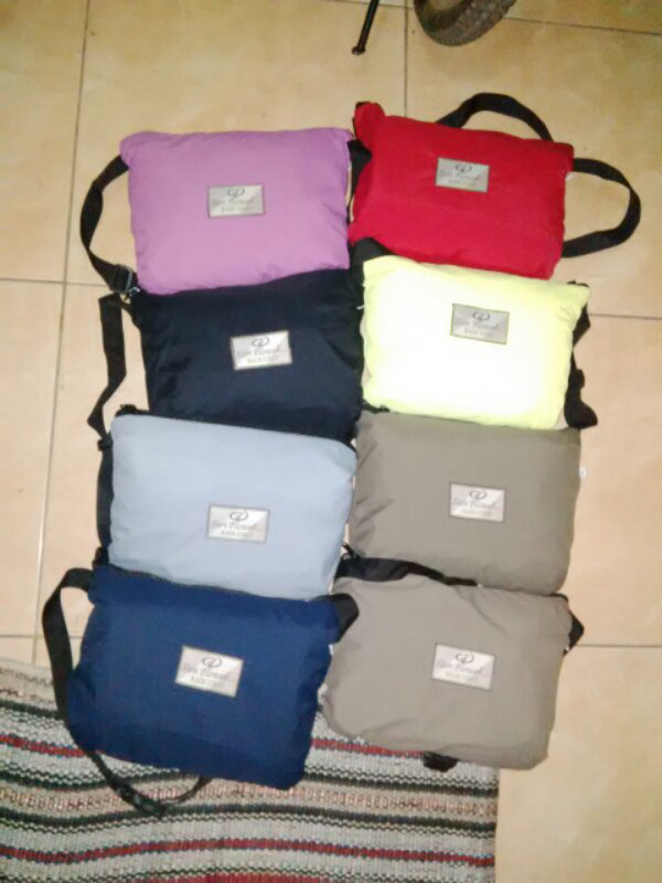 jas hujan sunflower