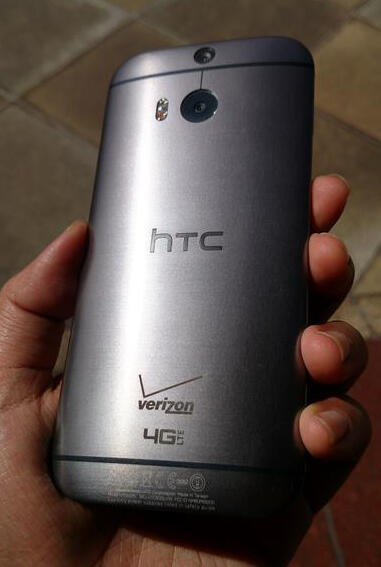 HTC one M8 32 GB Verizon + desktop charger (hdmi out) + slickwraps + melkco case