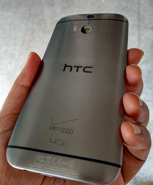 HTC one M8 32 GB Verizon + desktop charger (hdmi out) + slickwraps + melkco case