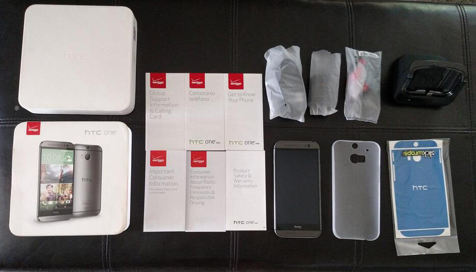HTC one M8 32 GB Verizon + desktop charger (hdmi out) + slickwraps + melkco case