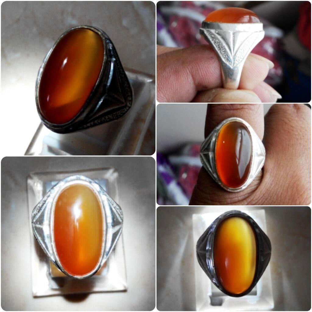 ITEM 17 REDISH ORANGE BENGKULU CAT&apos;<b>S</b> <b>EYE</b> DIMENSI : 17x8 mm est RING : ...