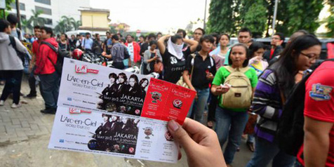 Perbedaan Antara Pengamen dan Musisi Profesional