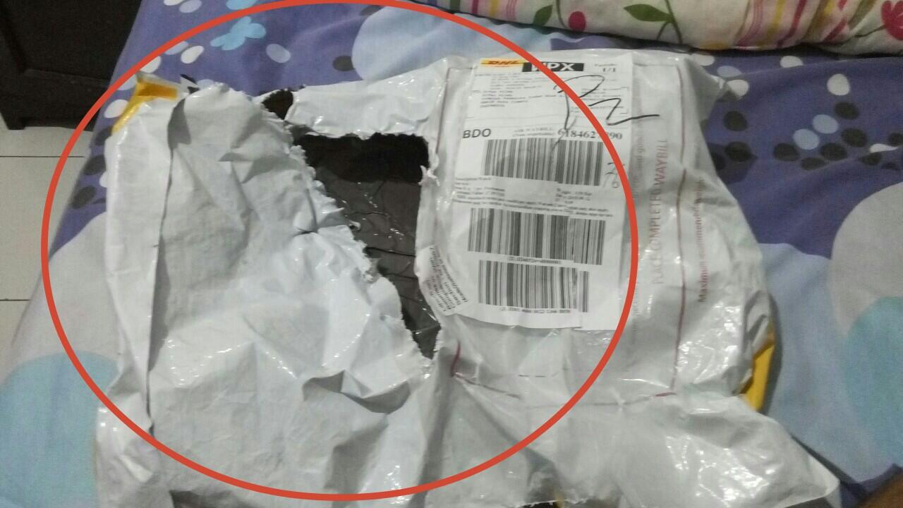 Kiriman DHL Dititipkan Tanpa Konfirmasi, Segel Rusak Dibuka Penerima yang Salah