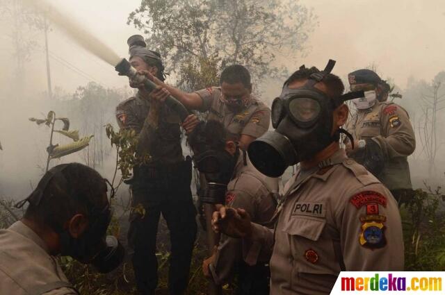 FOTO: Aksi Jokowi Terus Pantau Pemadaman Lahan Gambut di Kalimantan