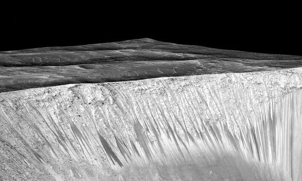 Nasa scientists find evidence of flowing water on Mars