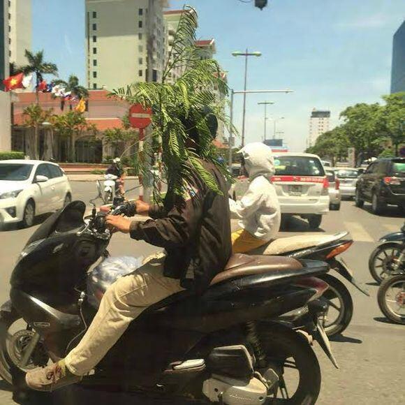 18 Potret cara aneh orang Vietnam hadapi teriknya matahari