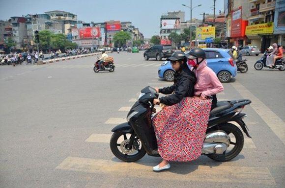 18 Potret cara aneh orang Vietnam hadapi teriknya matahari