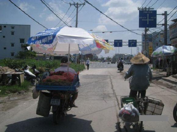 18 Potret cara aneh orang Vietnam hadapi teriknya matahari