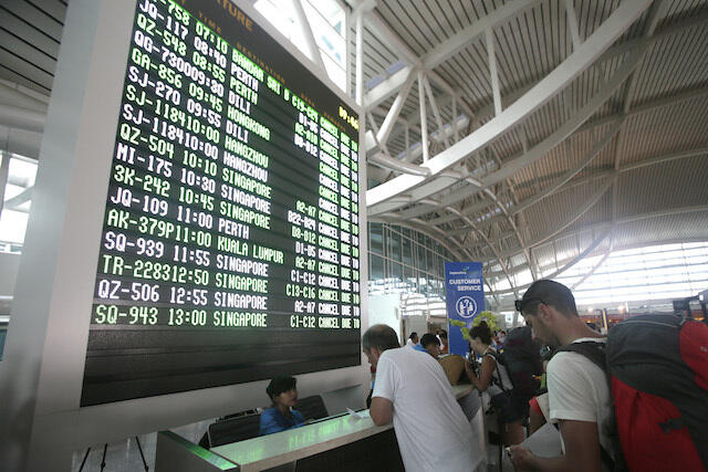 IN PHOTOS: Tourists stranded, flights canceled in Bali