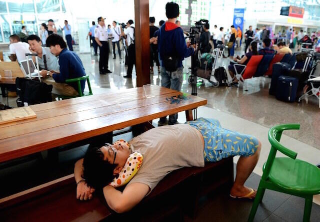 IN PHOTOS: Tourists stranded, flights canceled in Bali