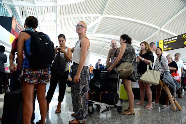 IN PHOTOS: Tourists stranded, flights canceled in Bali