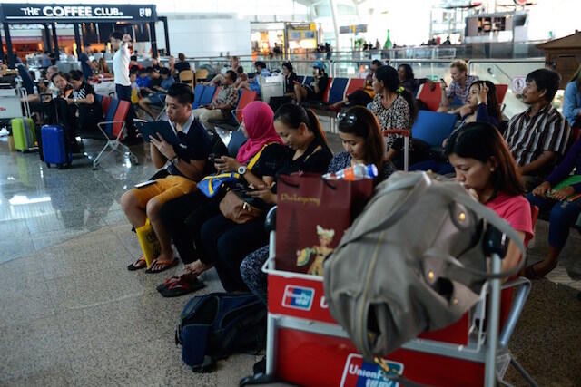 IN PHOTOS: Tourists stranded, flights canceled in Bali
