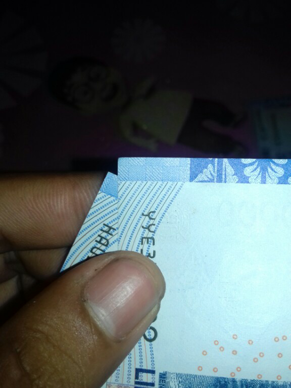 uang asli tapi palsu?