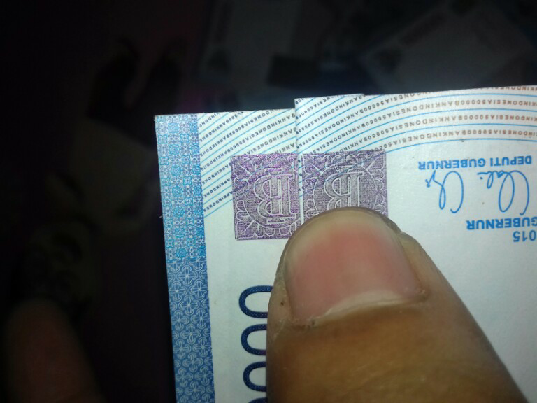 uang asli tapi palsu?