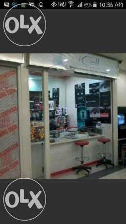 Staff counter Handphone di Galaxy Mall, suasana kerja nyaman dan santai