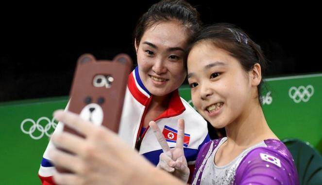 iyah , Selfie dengan Atlet Olimpiade Korsel, Atlet Korut Dihukum?